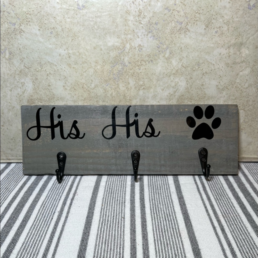 His his paw print leash holder.